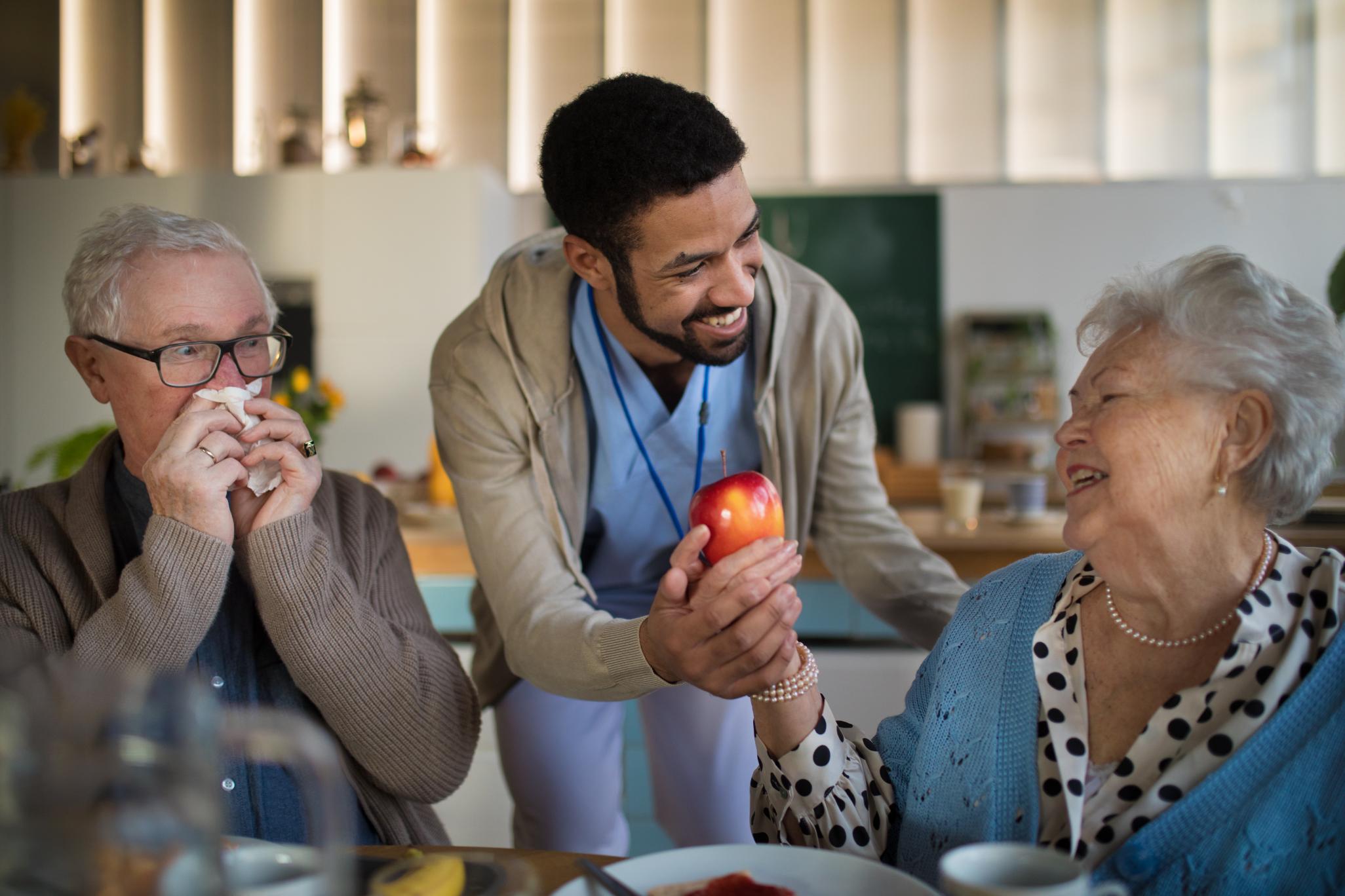 smiling-elderly-woman-and-man-enjoying-breakfast-i-2024-10-18-11-10-25-utc